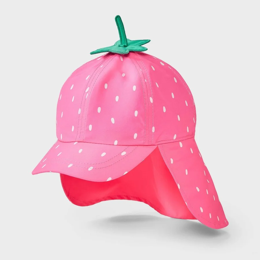Pink toddler girls strawberry print swim hat with wide brim on a white background