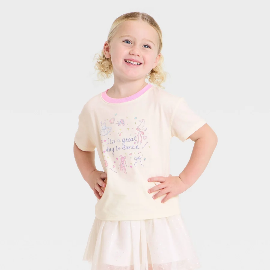 Light off-white relaxed toddler tee with a small front graphic
