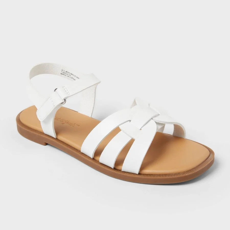 White kids' sandal with H-shaped upper strap and cushioned footbed on a white background